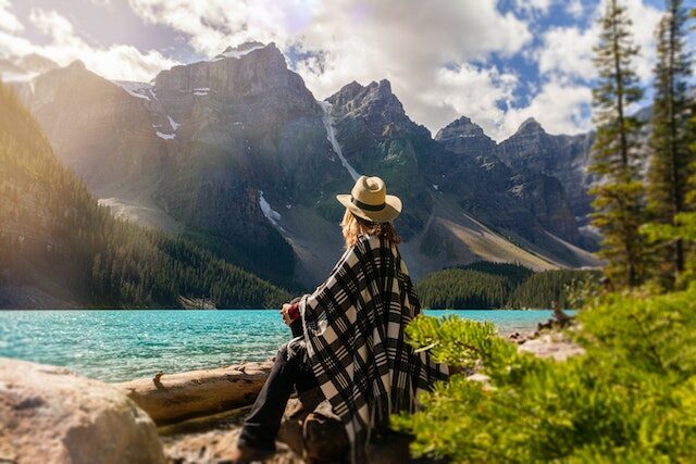 woman at mountain lake
